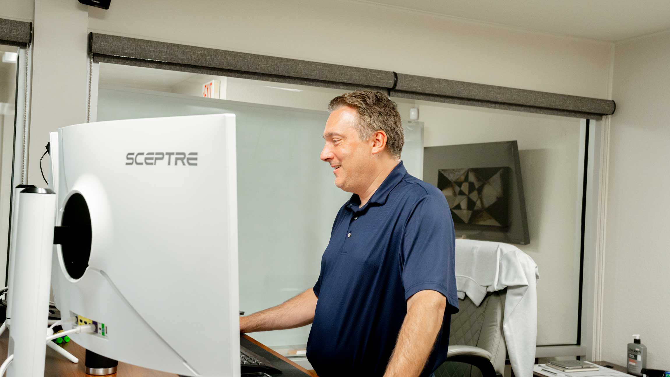 Man in Office at United Tel Supply at computer